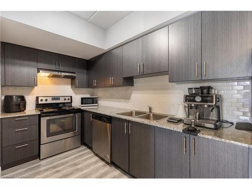 312-275 Larch Street, Waterloo, ON - Indoor Photo Showing Kitchen With Stainless Steel Kitchen With Double Sink