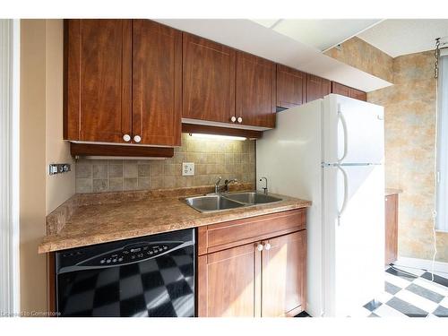 801-49 Robinson Street, Hamilton, ON - Indoor Photo Showing Kitchen With Double Sink