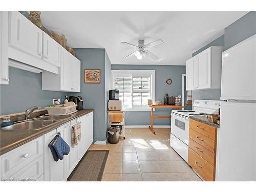 942 Upper Gage Avenue, Hamilton, ON - Indoor Photo Showing Kitchen With Double Sink