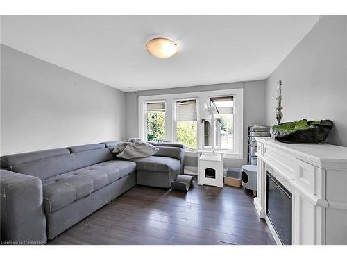 942 Upper Gage Avenue, Hamilton, ON - Indoor Photo Showing Living Room With Fireplace