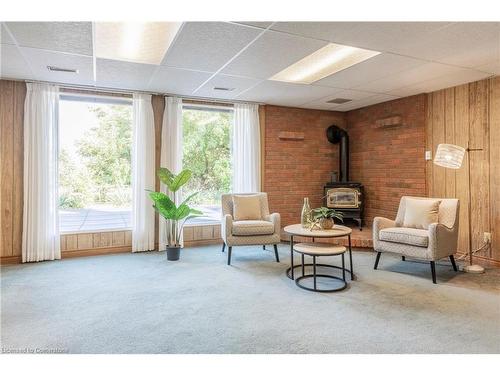 25 Ridge Road E, Grimsby, ON - Indoor With Fireplace