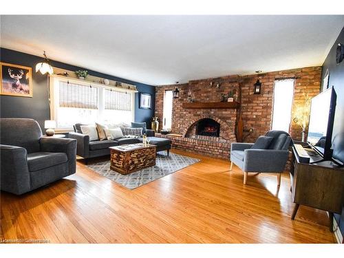 2406 North Shore Drive, Lowbanks, ON - Indoor Photo Showing Living Room With Fireplace