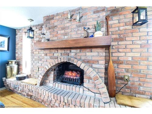 2406 North Shore Drive, Lowbanks, ON - Indoor Photo Showing Living Room With Fireplace