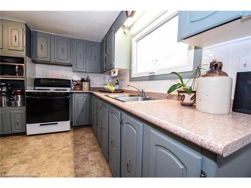 2406 North Shore Drive, Lowbanks, ON - Indoor Photo Showing Kitchen With Double Sink