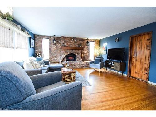 2406 North Shore Drive, Lowbanks, ON - Indoor Photo Showing Living Room With Fireplace