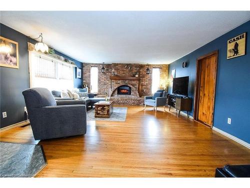 2406 North Shore Drive, Lowbanks, ON - Indoor Photo Showing Living Room With Fireplace