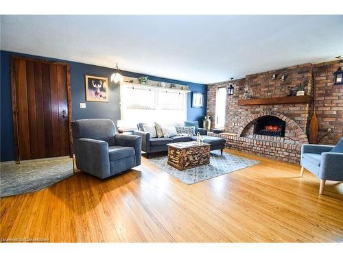 2406 North Shore Drive, Lowbanks, ON - Indoor Photo Showing Living Room With Fireplace