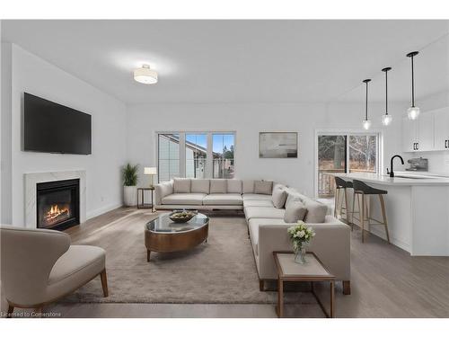 9 Santa Barbara Lane, Georgetown, ON - Indoor Photo Showing Living Room With Fireplace