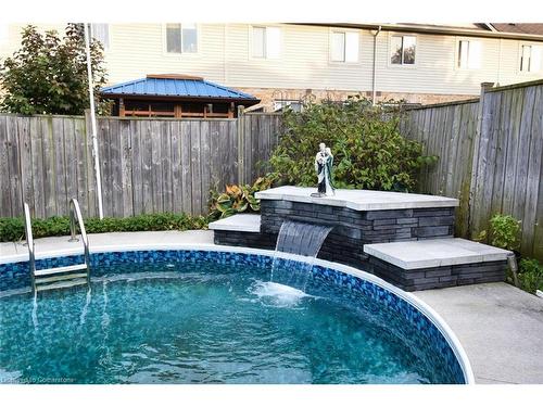 30 Newlove Street, Hamilton, ON - Outdoor With Above Ground Pool