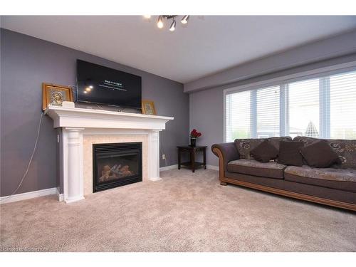 30 Newlove Street, Hamilton, ON - Indoor Photo Showing Living Room With Fireplace