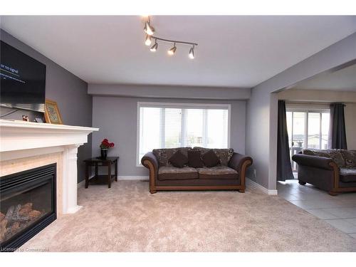 30 Newlove Street, Hamilton, ON - Indoor Photo Showing Living Room With Fireplace