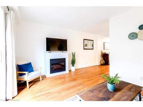 49 Morwick Drive, Ancaster, ON - Indoor Photo Showing Living Room With Fireplace