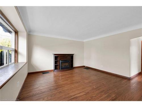 63 Fernwood Crescent, Hamilton, ON - Indoor Photo Showing Living Room With Fireplace