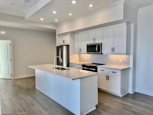 101-1880 Gordon Street, Guelph, ON - Indoor Photo Showing Kitchen With Stainless Steel Kitchen With Double Sink With Upgraded Kitchen