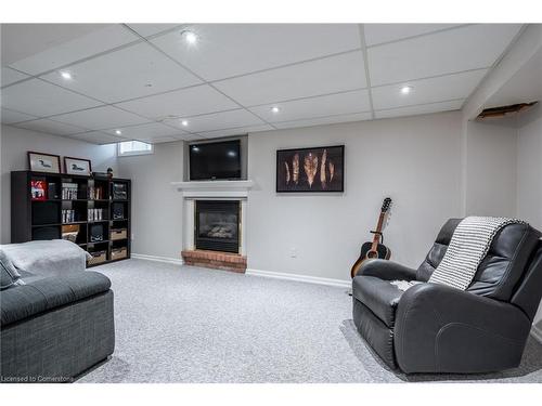 2083 Edgebank Court, Burlington, ON - Indoor Photo Showing Basement With Fireplace