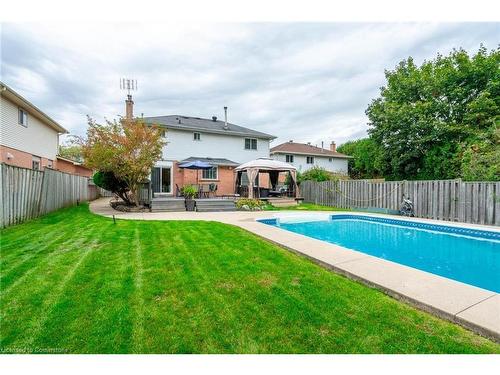 2083 Edgebank Court, Burlington, ON - Outdoor With In Ground Pool With Deck Patio Veranda With Backyard