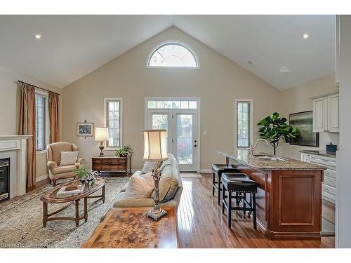 1-2141 Caroline Street, Burlington, ON - Indoor Photo Showing Living Room With Fireplace