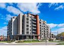 111-30 Hamilton Street S, Waterdown, ON  - Outdoor With Facade 