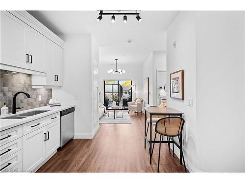 111-30 Hamilton Street S, Waterdown, ON - Indoor Photo Showing Kitchen With Double Sink With Upgraded Kitchen