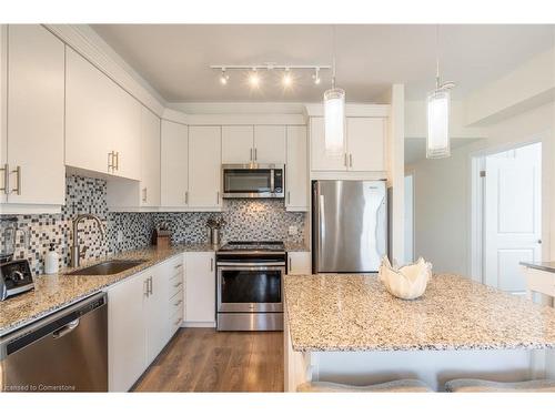 310-4040 Upper Middle Road, Burlington, ON - Indoor Photo Showing Kitchen With Stainless Steel Kitchen With Upgraded Kitchen