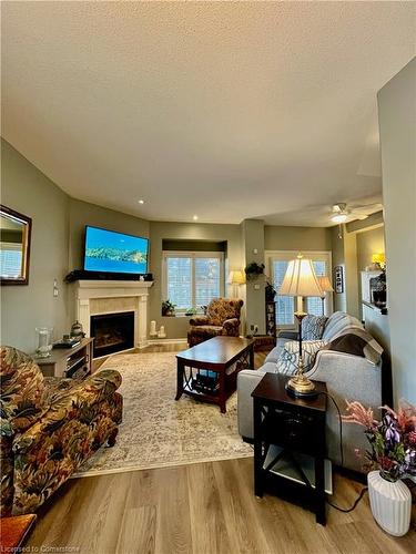 21-1375 Stephenson Drive, Burlington, ON - Indoor Photo Showing Living Room With Fireplace