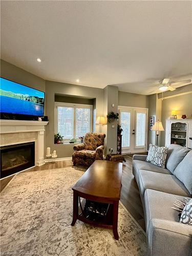 21-1375 Stephenson Drive, Burlington, ON - Indoor Photo Showing Living Room With Fireplace