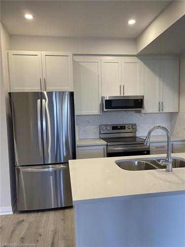 205-12 Blanshard Street, Hamilton, ON - Indoor Photo Showing Kitchen With Double Sink