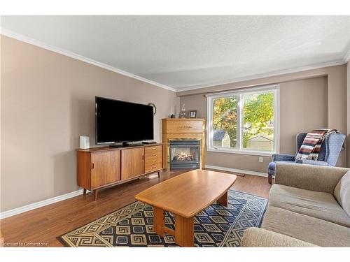 77 Boulder Crescent, Guelph, ON - Indoor Photo Showing Living Room With Fireplace