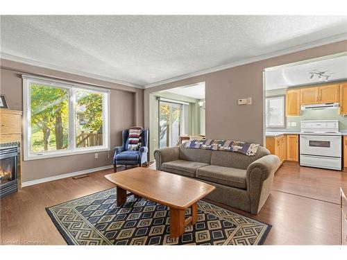 77 Boulder Crescent, Guelph, ON - Indoor Photo Showing Living Room With Fireplace