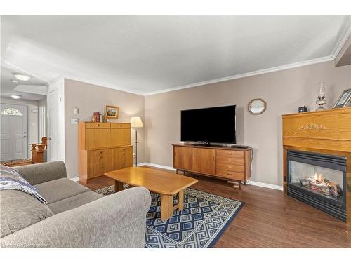 77 Boulder Crescent, Guelph, ON - Indoor Photo Showing Living Room With Fireplace