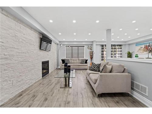 8481 Jennifer Crescent, Niagara Falls, ON - Indoor Photo Showing Living Room With Fireplace