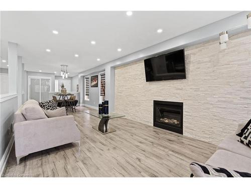 8481 Jennifer Crescent, Niagara Falls, ON - Indoor Photo Showing Living Room With Fireplace