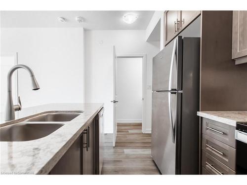 1001-470 Dundas Street E, Waterdown, ON - Indoor Photo Showing Kitchen With Double Sink