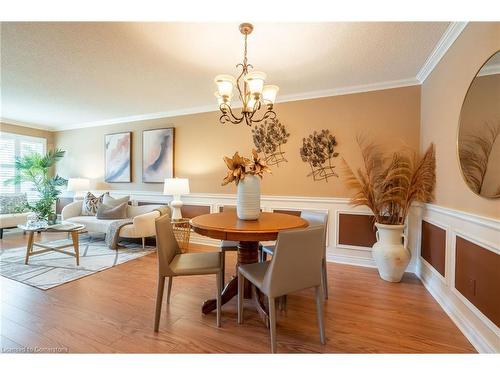 35-10 Wentworth Drive, Grimsby, ON - Indoor Photo Showing Dining Room With Fireplace