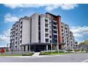 701-30 Hamilton Street S, Waterdown, ON  - Outdoor With Balcony With Facade 