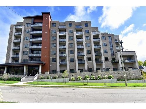 701-30 Hamilton Street S, Waterdown, ON - Outdoor With Balcony With Facade