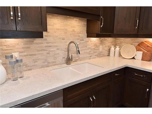 701-30 Hamilton Street S, Waterdown, ON - Indoor Photo Showing Kitchen With Double Sink