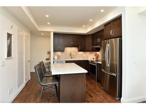 701-30 Hamilton Street S, Waterdown, ON - Indoor Photo Showing Kitchen With Stainless Steel Kitchen With Upgraded Kitchen