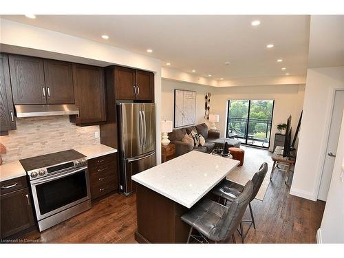 701-30 Hamilton Street S, Waterdown, ON - Indoor Photo Showing Kitchen With Stainless Steel Kitchen