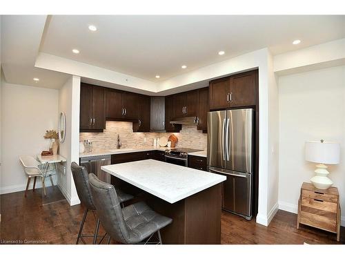 701-30 Hamilton Street S, Waterdown, ON - Indoor Photo Showing Kitchen With Stainless Steel Kitchen With Upgraded Kitchen