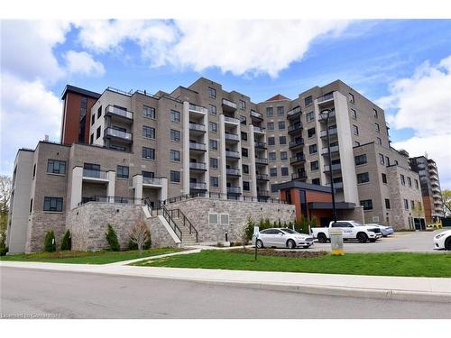 701-30 Hamilton Street S, Waterdown, ON - Outdoor With Balcony With Facade