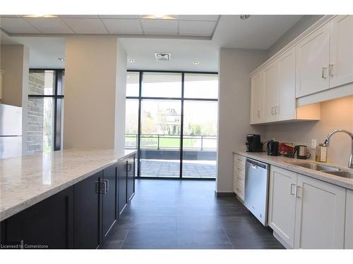 701-30 Hamilton Street S, Waterdown, ON - Indoor Photo Showing Kitchen With Double Sink