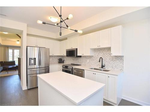 5-383 Dundas Street E, Waterdown, ON - Indoor Photo Showing Kitchen With Stainless Steel Kitchen With Double Sink