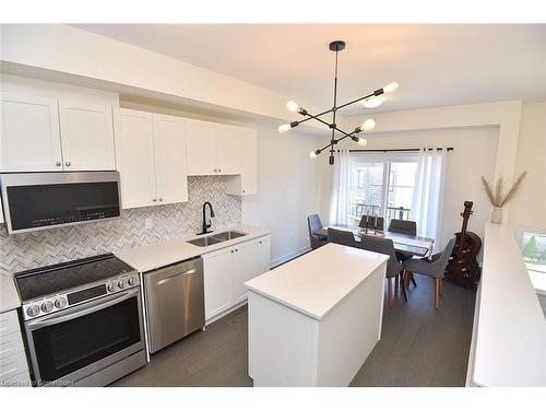 5-383 Dundas Street E, Waterdown, ON - Indoor Photo Showing Kitchen With Stainless Steel Kitchen With Double Sink