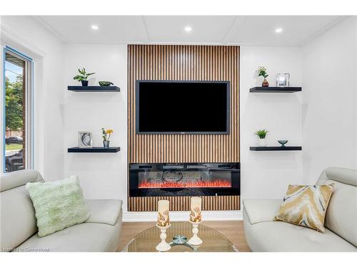 64 Viceroy Court, Hamilton, ON - Indoor Photo Showing Living Room With Fireplace