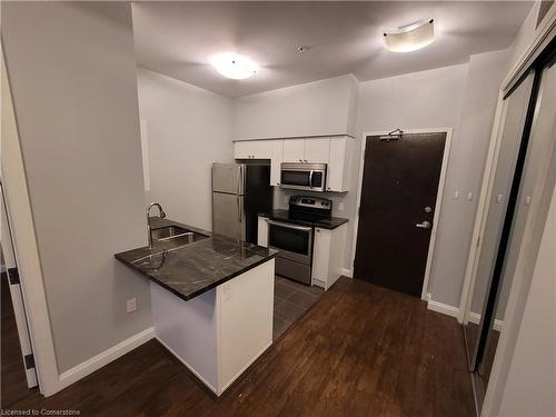 607-112 King Street E, Hamilton, ON - Indoor Photo Showing Kitchen With Double Sink