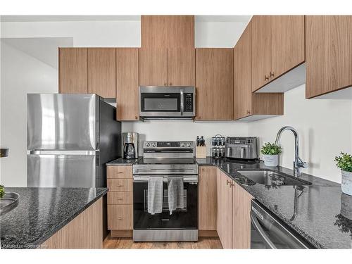 601-460 Gordon Krantz Avenue, Milton, ON - Indoor Photo Showing Kitchen With Stainless Steel Kitchen With Upgraded Kitchen