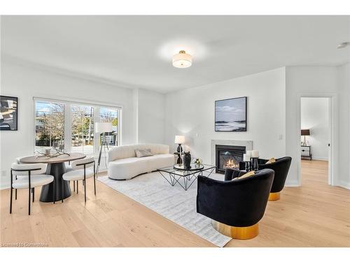 4 Santa Barbara Lane, Georgetown, ON - Indoor Photo Showing Living Room With Fireplace