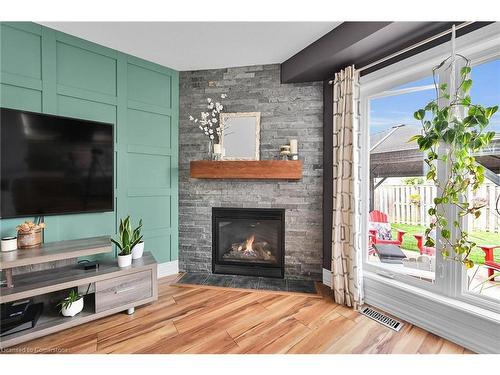 63 Edna Avenue, Hamilton, ON - Indoor Photo Showing Living Room With Fireplace