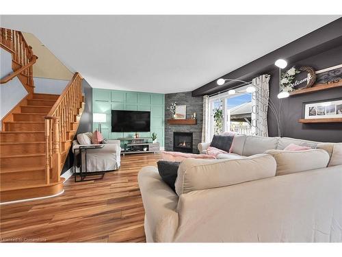 63 Edna Avenue, Hamilton, ON - Indoor Photo Showing Living Room With Fireplace